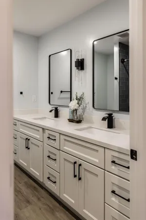 a bathroom with a sink and mirror