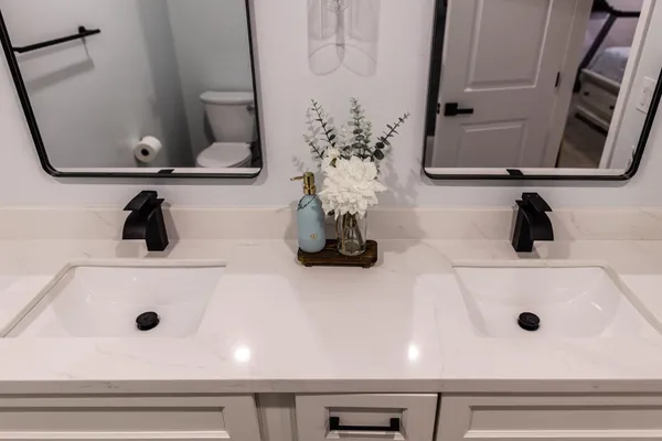 a bathroom with a toilet and a bathtub