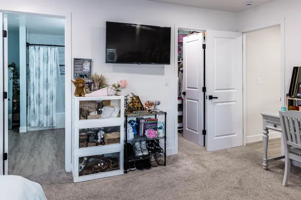 a bathroom with a double vanity sink and mirror