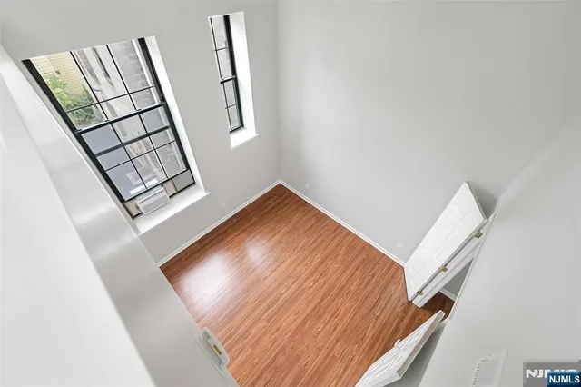 a view of an entryway with hardwood