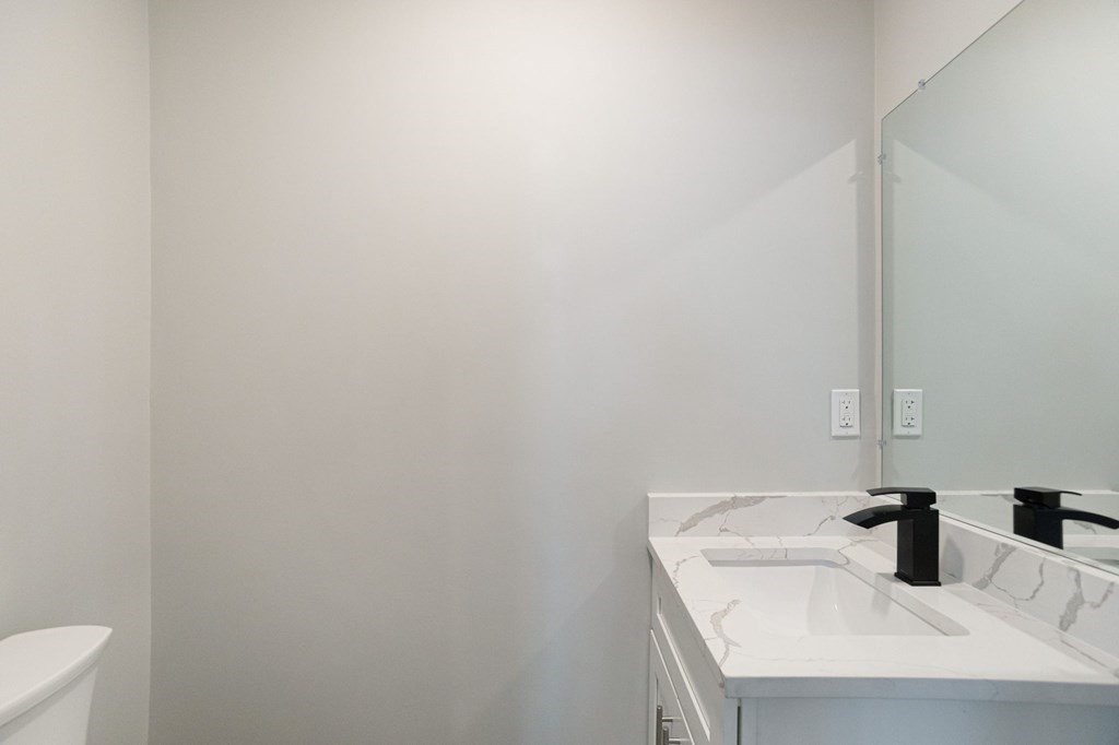 34 Brookvale Street Boston, MA 02124 - Photo 17 of 36 a bathroom with a sink and mirror