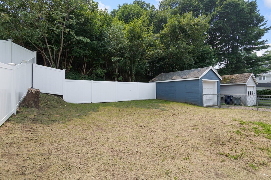 34 Brookvale Street Boston, MA 02124 - Photo 29 of 36 a view of a house with backyard and tree