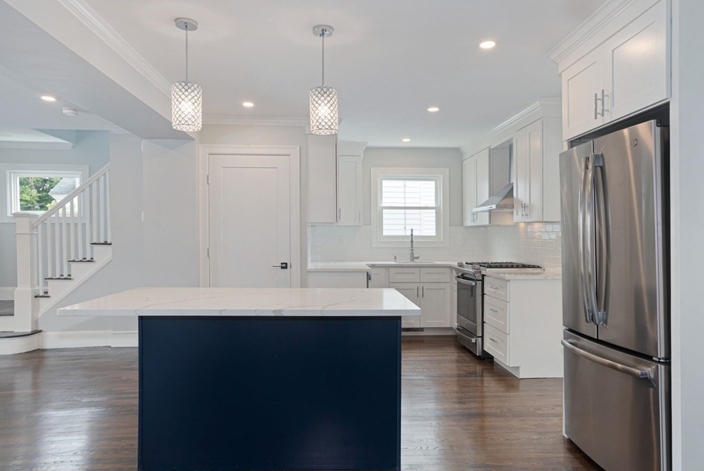 34 Brookvale Street Boston, MA 02124 - Photo 6 of 36 a kitchen with counter top space and refrigerator