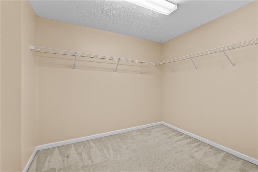 2760 Rusticwood Drive Southwest Snellville, GA 30078 - Photo 30 of 48 a view of an empty walk in closet