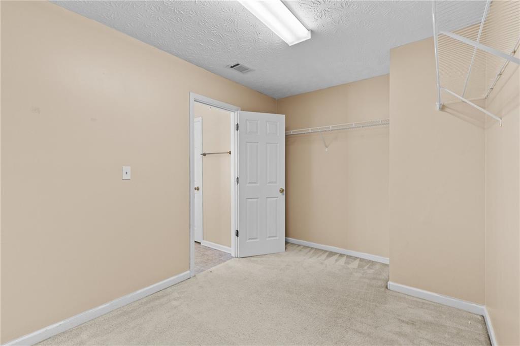 2760 Rusticwood Drive Southwest Snellville, GA 30078 - Photo 31 of 48 a view of an empty room