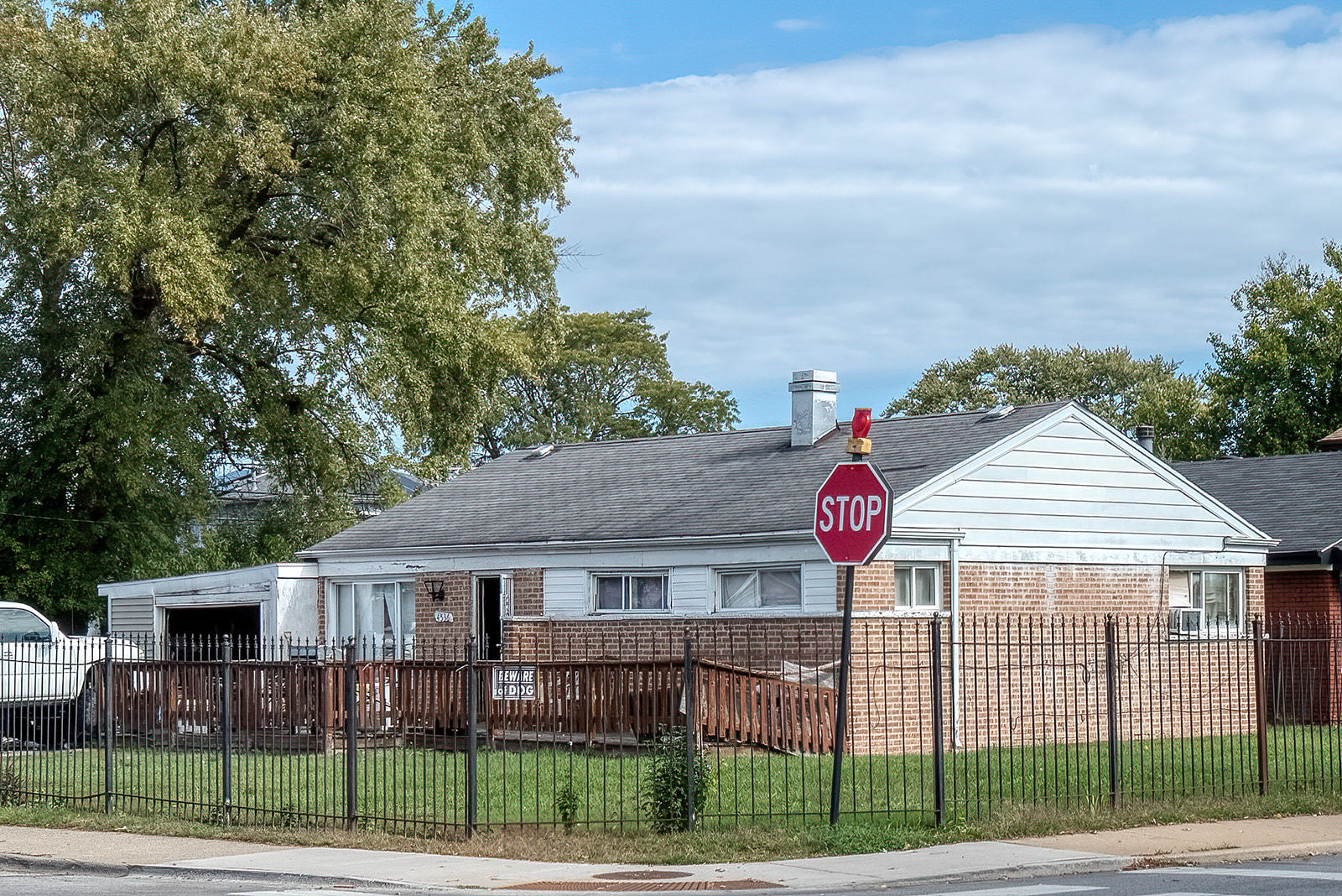 4536 West 83rd Street Chicago, IL 60652 - Photo 3 of 6 a view of a house next to a yard