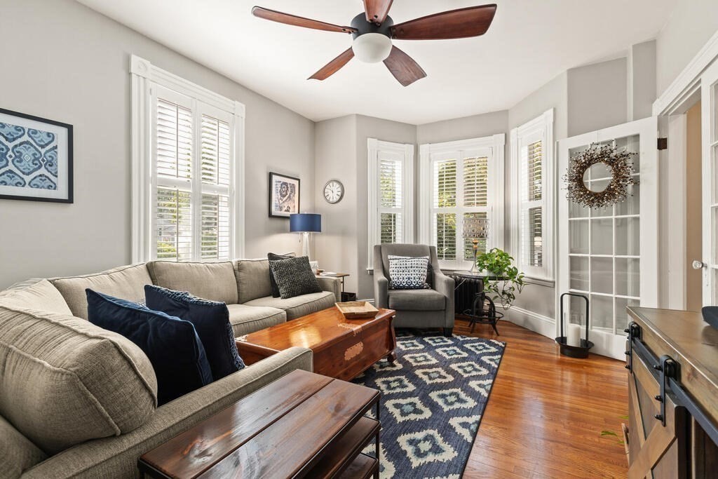 33 Porter Street, Unit 33 Woburn, MA 01801 - Photo 6 of 25 a living room with furniture and a window