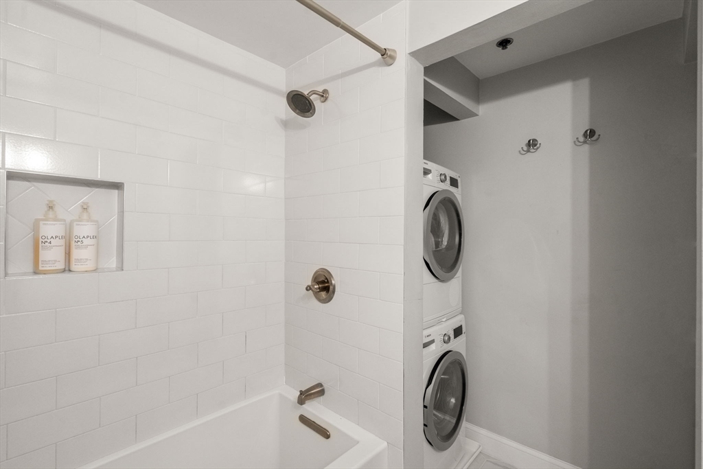 17 Henley Street, Unit F Boston, MA 02129 - Photo 14 of 19 a bathroom with a sink a washer and dryer