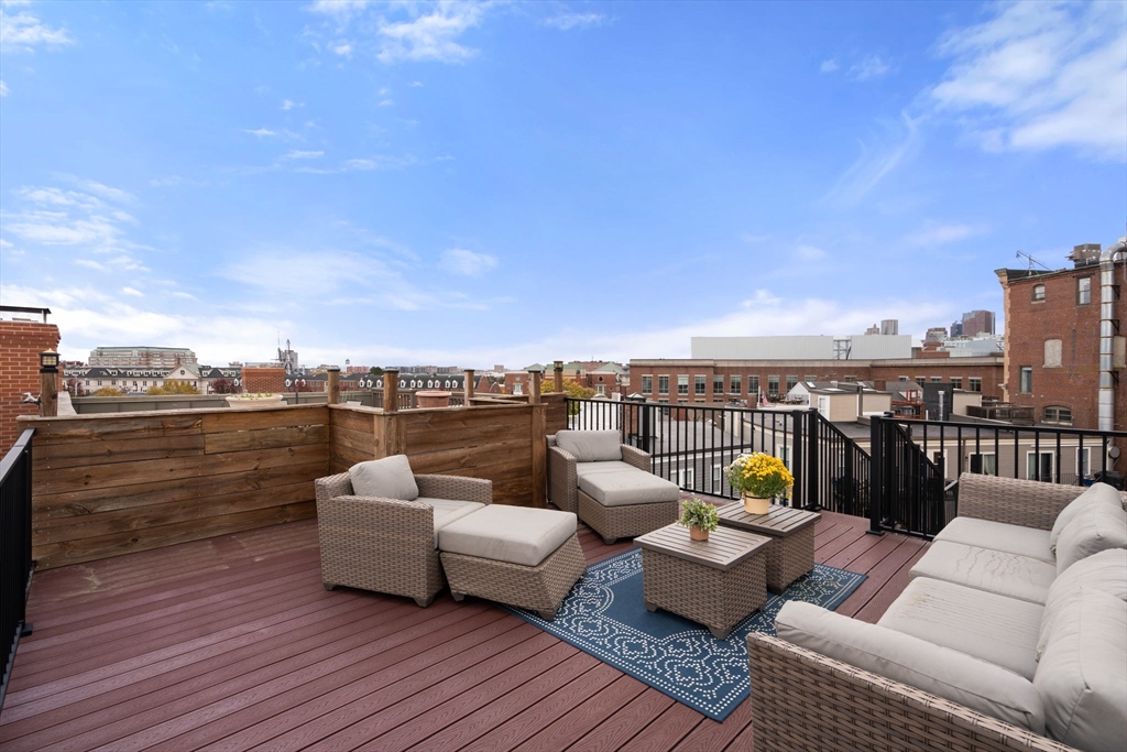 17 Henley Street, Unit F Boston, MA 02129 - Photo 17 of 19 a terrace view with seating space