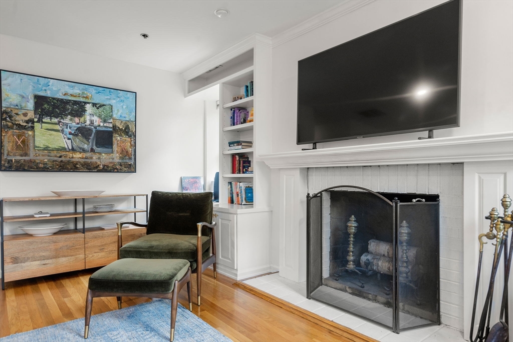 17 Henley Street, Unit F Boston, MA 02129 - Photo 3 of 19 a living room with furniture and a flat screen tv