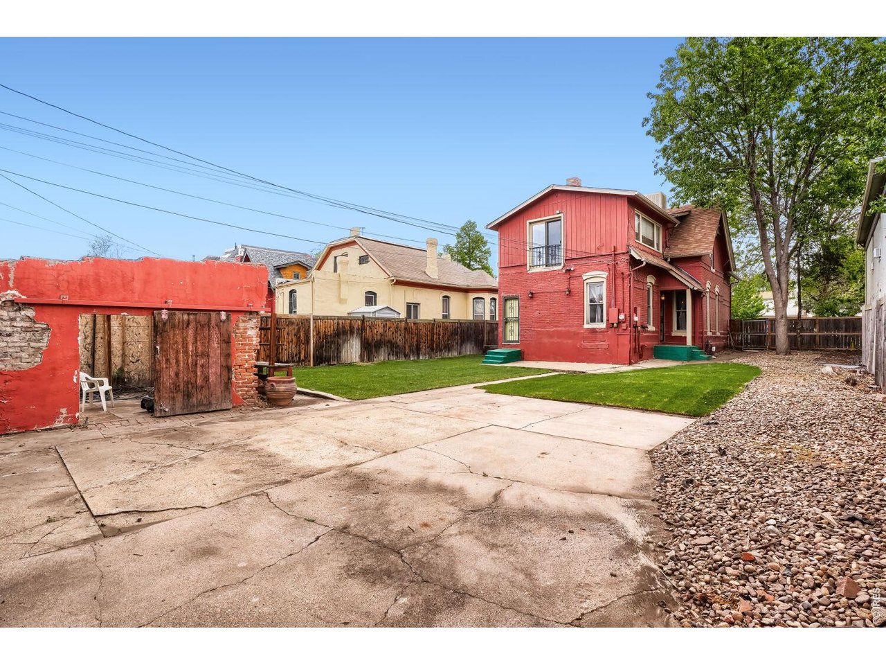 2929 Curtis Street Denver, CO 80205 - Photo 36 of 43 Existing structure can be removed and footprint allowed to be built upon for potential ADU.