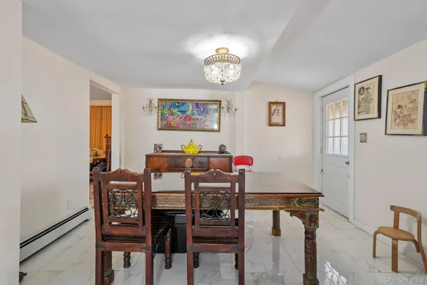 a view of a dining room with furniture