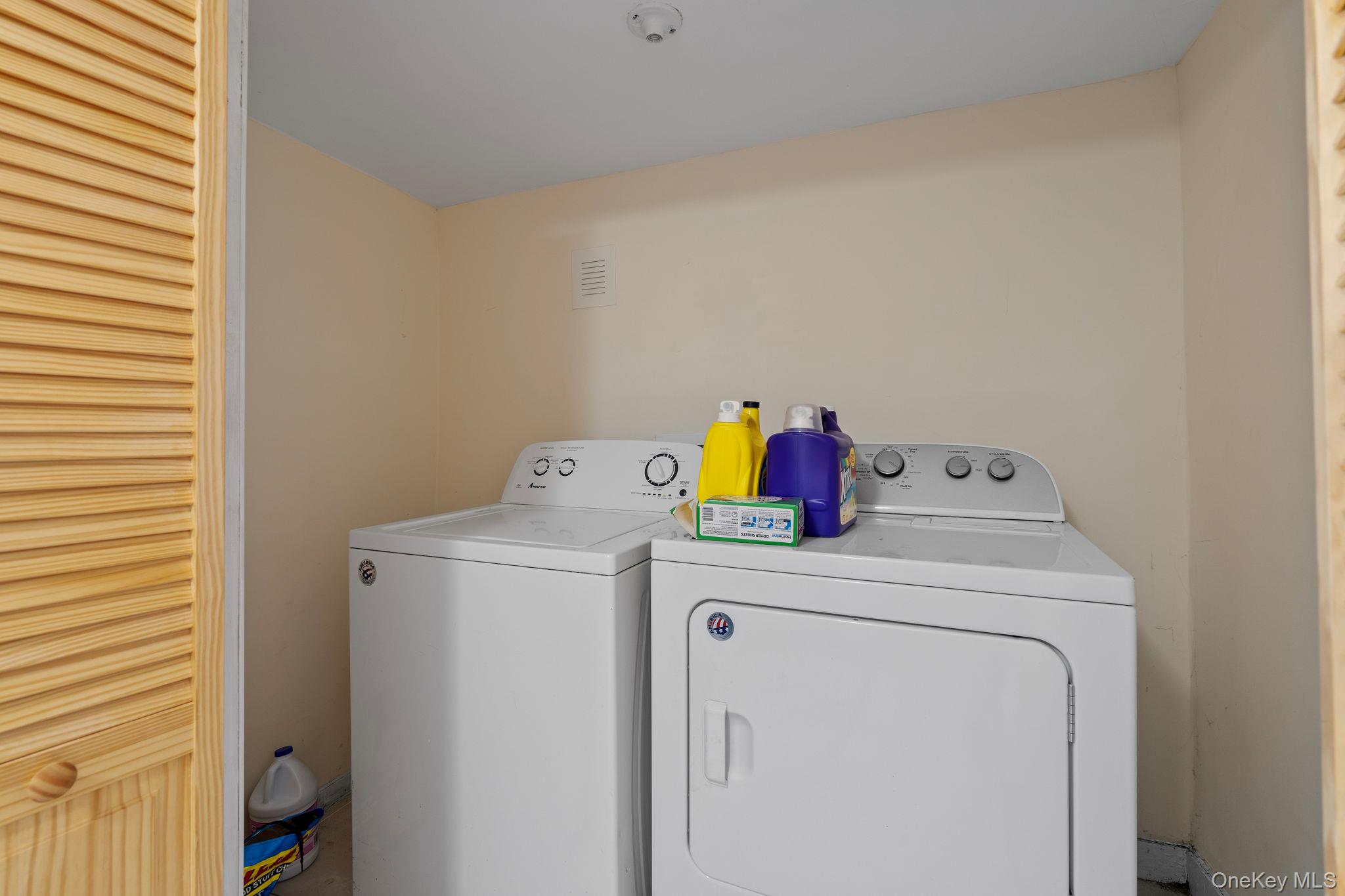 18-20 Spring Street Port Jervis, NY 12771 - Photo 33 of 46 a utility room with dryer and washer