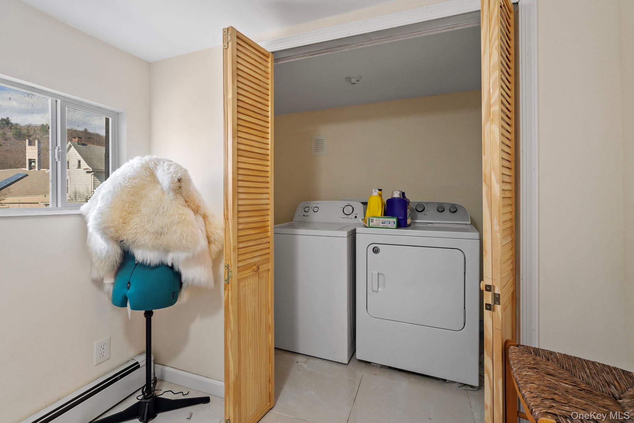 18-20 Spring Street Port Jervis, NY 12771 - Photo 34 of 46 a bath room with a washer and dryer