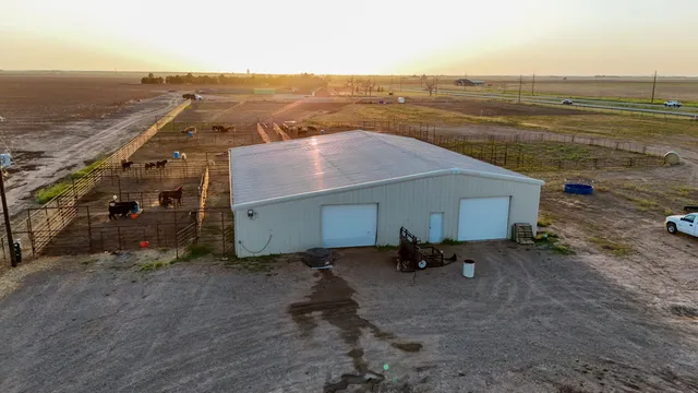 a view of a terrace with wooden floor and ocean view