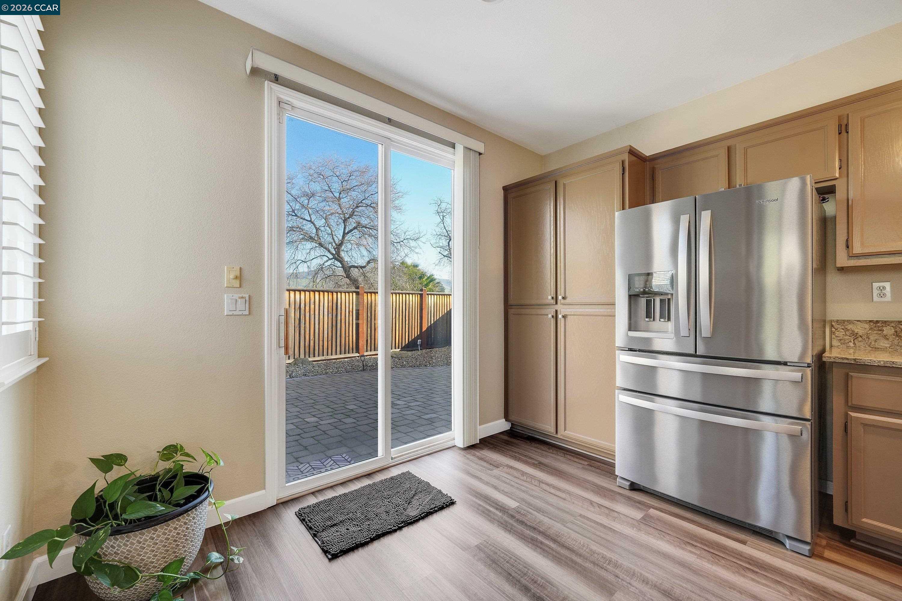 738 Marsh Place Fairfield, CA 94533 - Photo 16 of 45 a kitchen with stainless steel appliances a refrigerator and a window