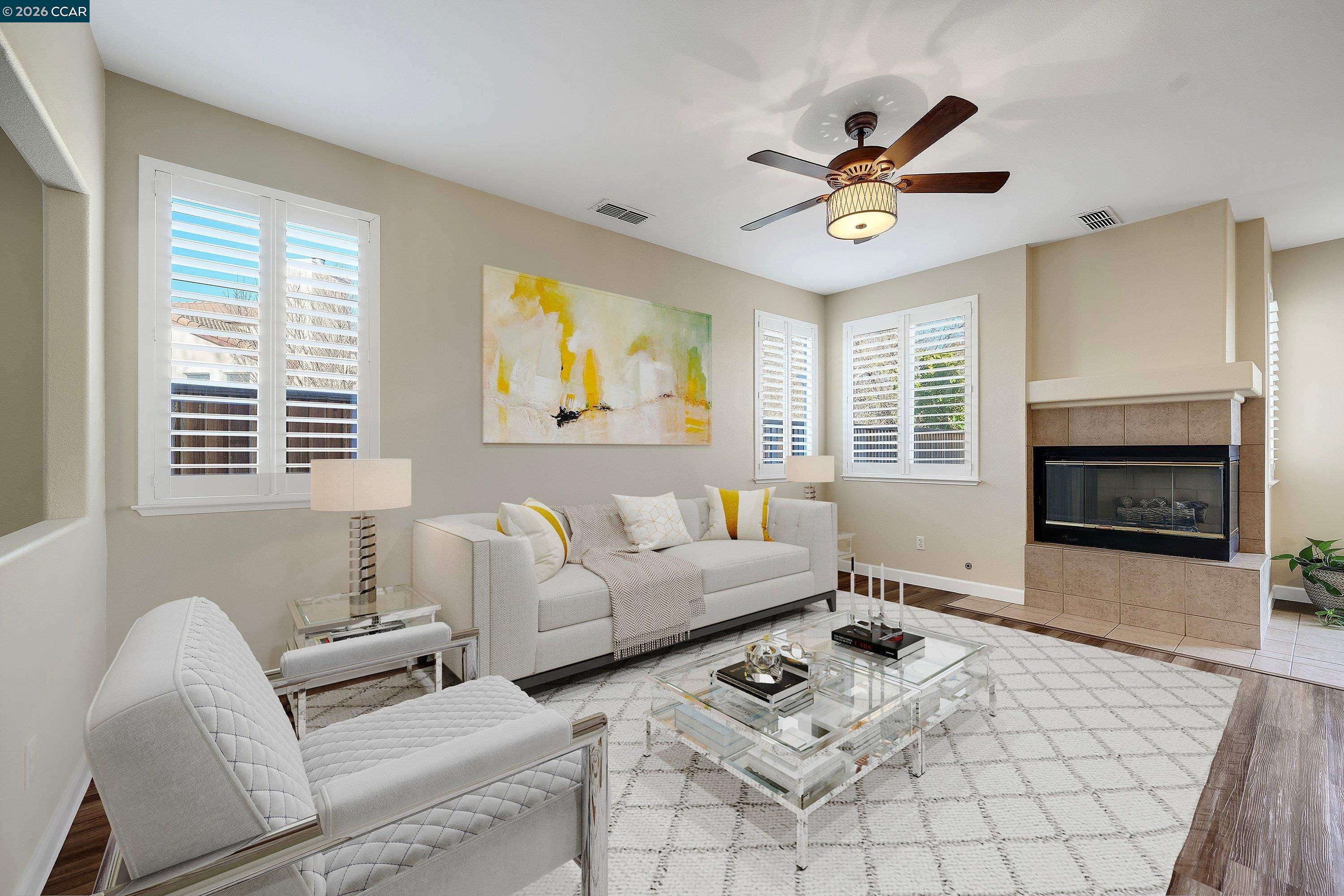 738 Marsh Place Fairfield, CA 94533 - Photo 19 of 45 a living room with furniture a fireplace two window and a ceiling fan