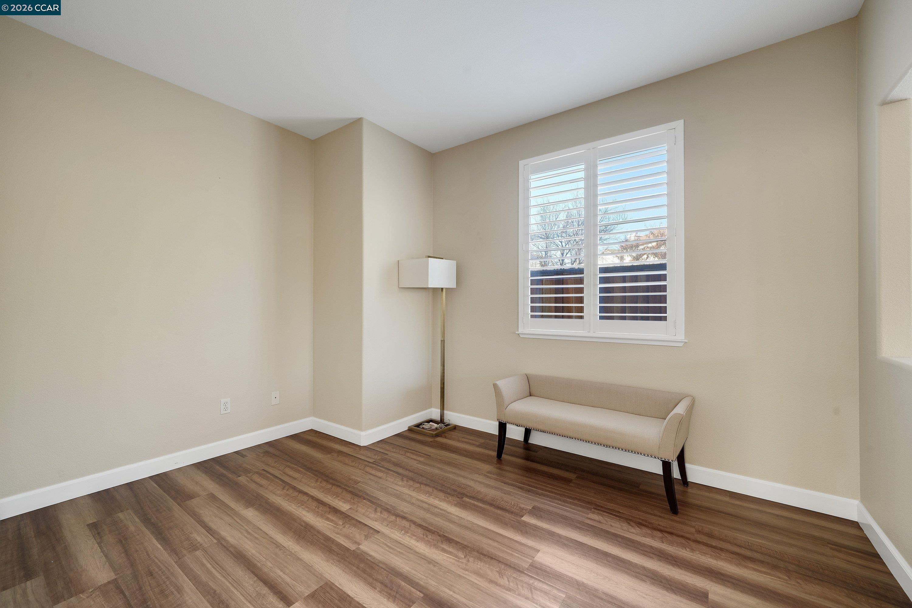738 Marsh Place Fairfield, CA 94533 - Photo 22 of 45 a view of a livingroom with wooden floor and a window
