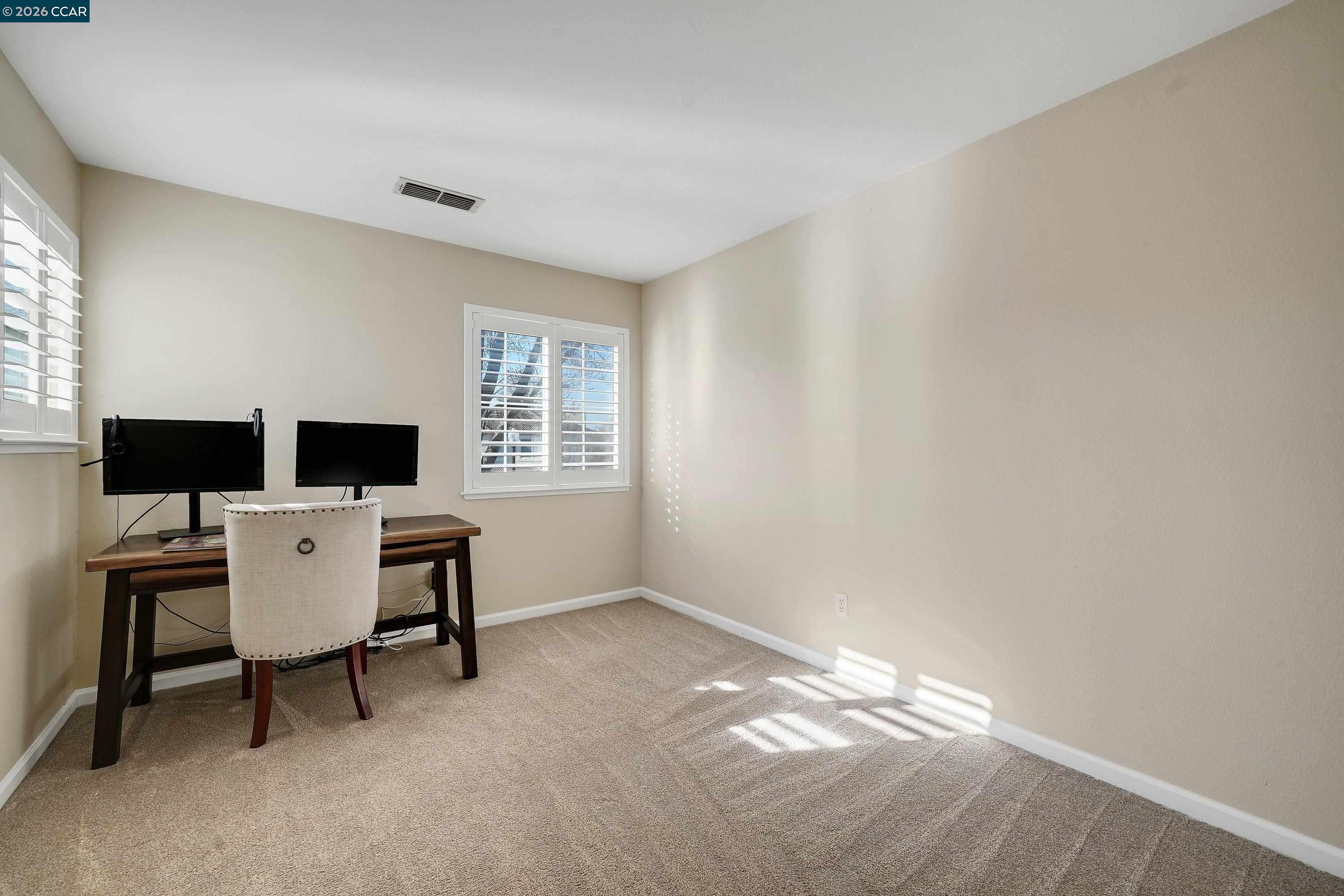 738 Marsh Place Fairfield, CA 94533 - Photo 30 of 45 a workspace with furniture and window