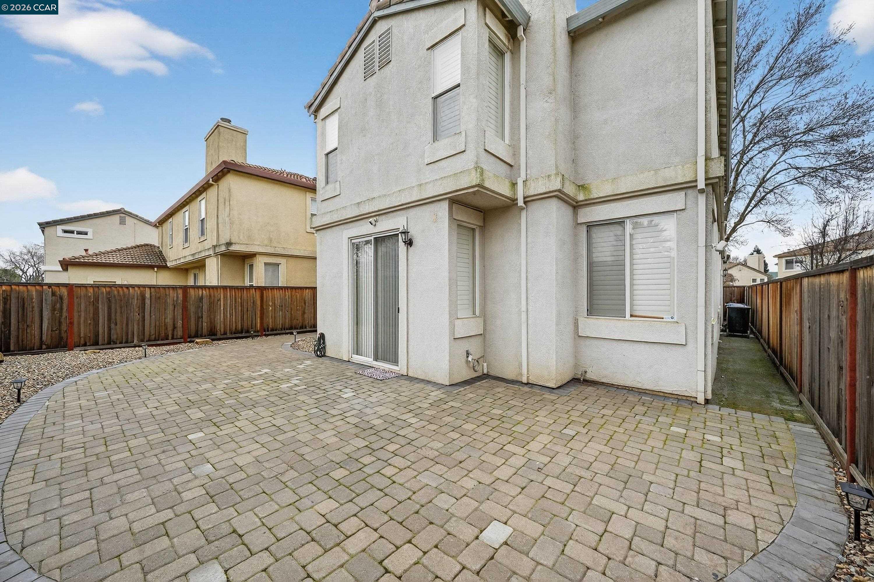 738 Marsh Place Fairfield, CA 94533 - Photo 37 of 45 a view of a house with a wooden fence