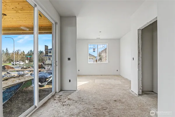 a view of an empty room and window