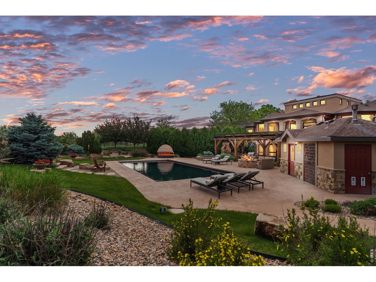 964 Riparian Way Fort Collins, CO 80524 - Photo 19 of 42 a view of a patio with chairs and table