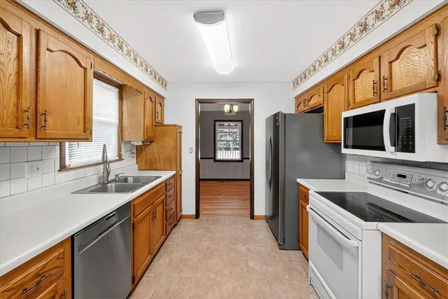 $320,000 | 317 South Valley Road, Olathe, KS 66061