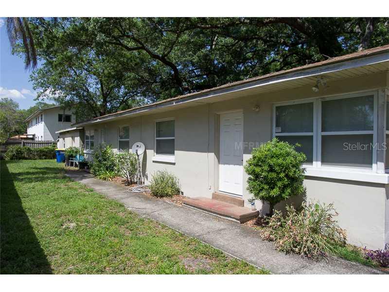 912 Lakeview Road Clearwater, FL 33756 - Photo 1 of 1 a front view of a house with garden