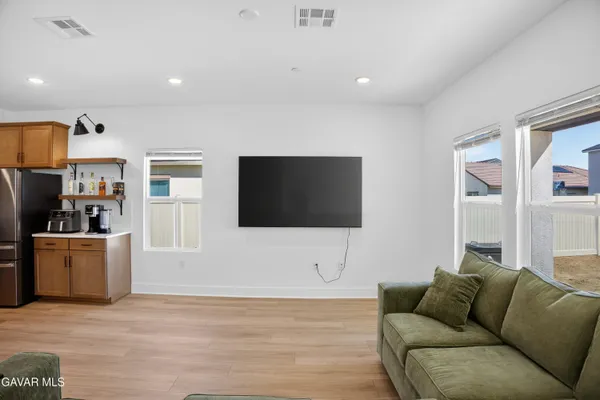 a living room with furniture and a couch