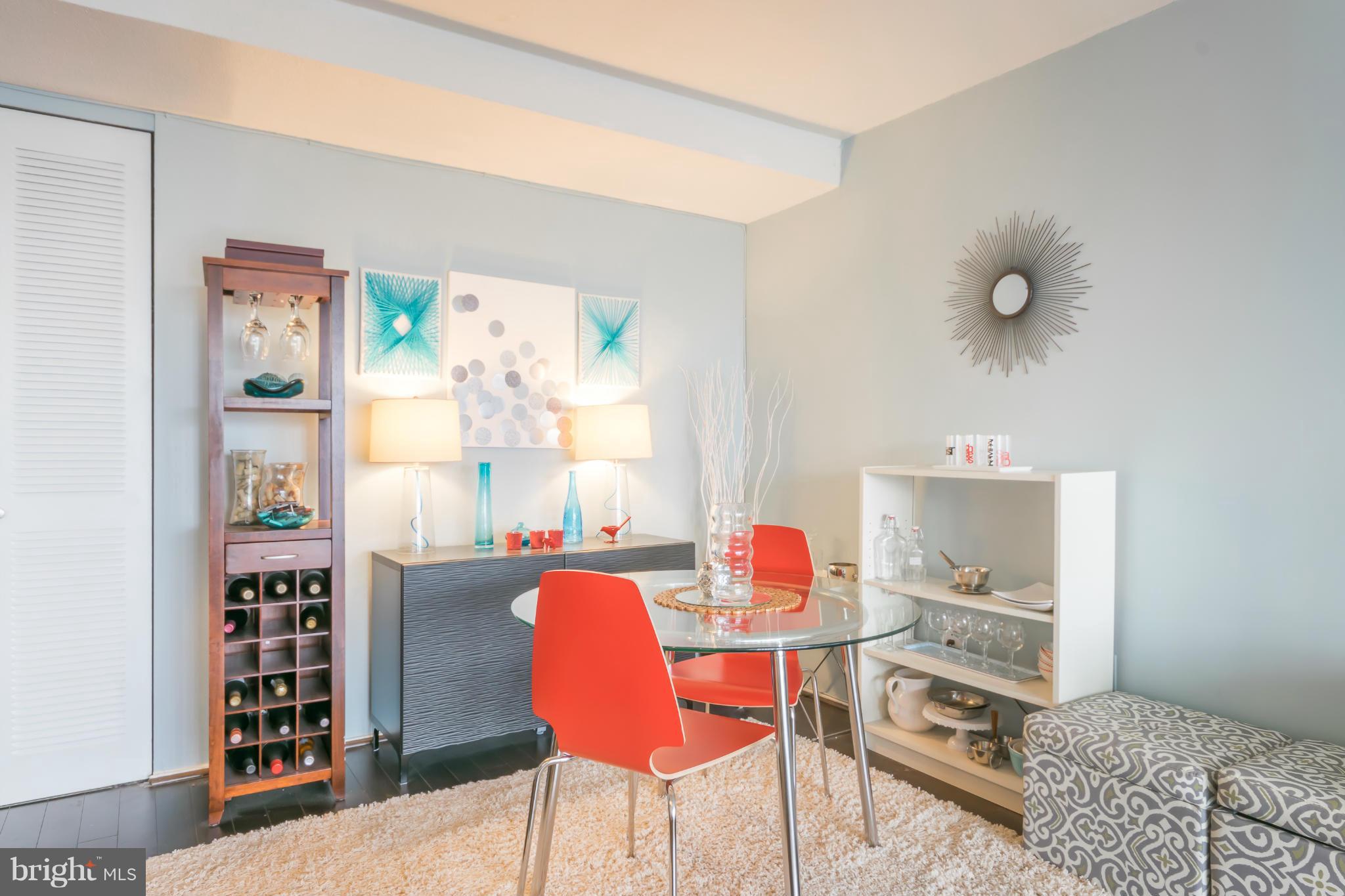 1301 Delaware Avenue Southwest, Unit N816 Washington, DC 20024 - Photo 6 of 20 a workspace with furniture and window