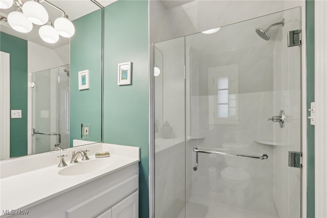 922 Mayfair Road Akron, OH 44303 - Photo 22 of 39 Full bath featuring a stall shower and vanity