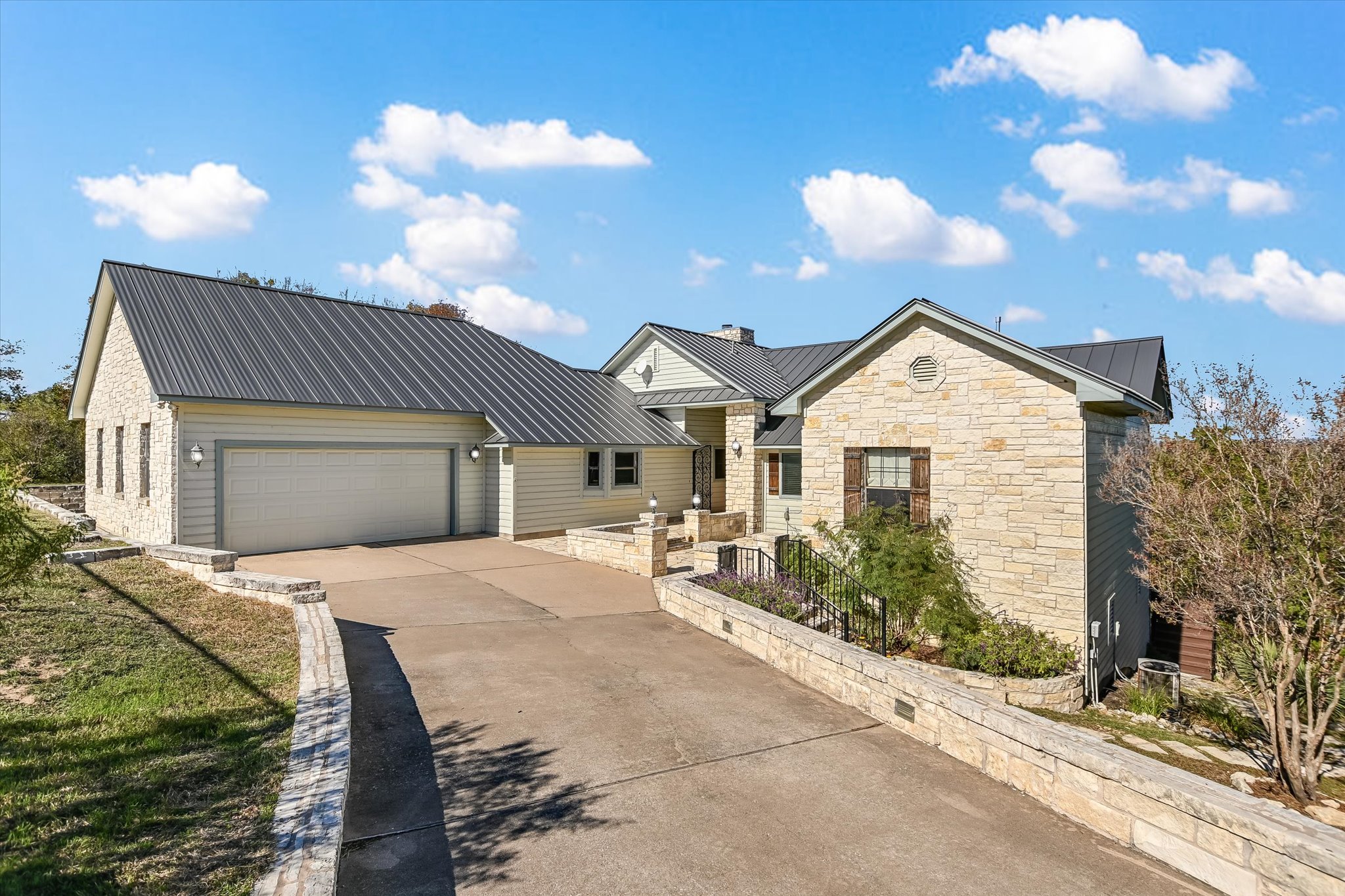 a view of house with yard and entertaining space