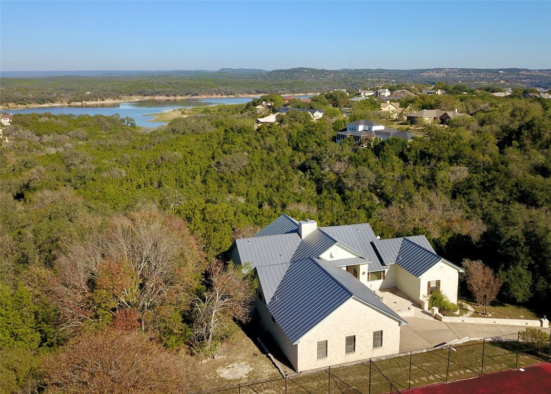116 Courtside Way Spicewood, TX 78669 - Photo 30 of 40 a view of a city with an ocean