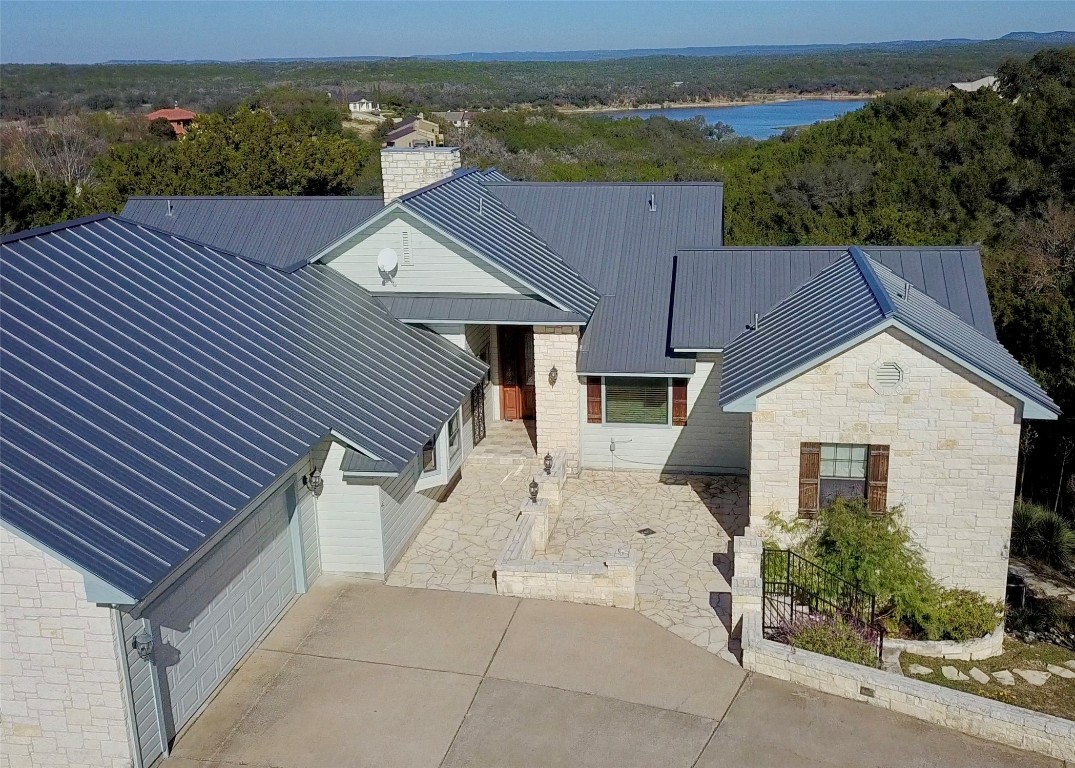 116 Courtside Way Spicewood, TX 78669 - Photo 31 of 40 an aerial view of a house with a yard