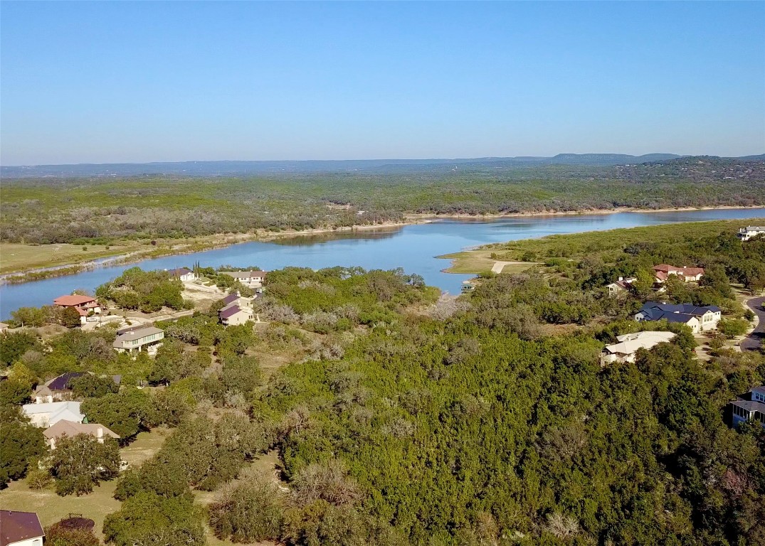 116 Courtside Way Spicewood, TX 78669 - Photo 36 of 40 a view of an ocean and beach