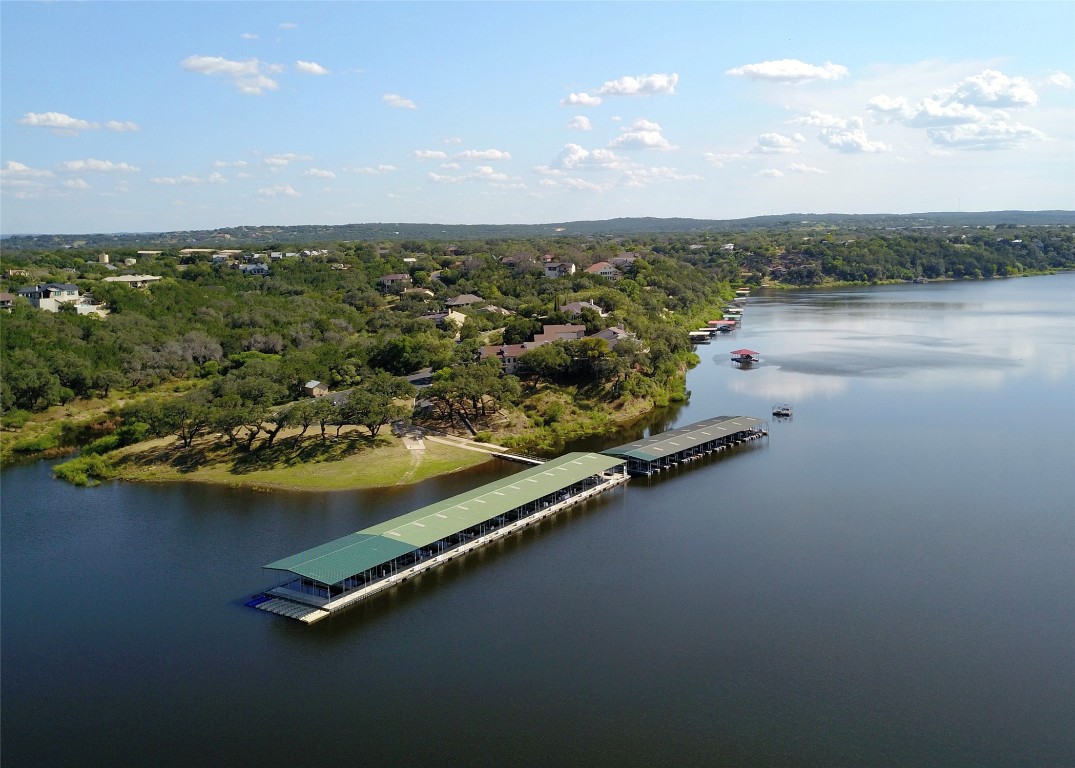 116 Courtside Way Spicewood, TX 78669 - Photo 38 of 40 an aerial view of ocean with residential houses with outdoor space and seating