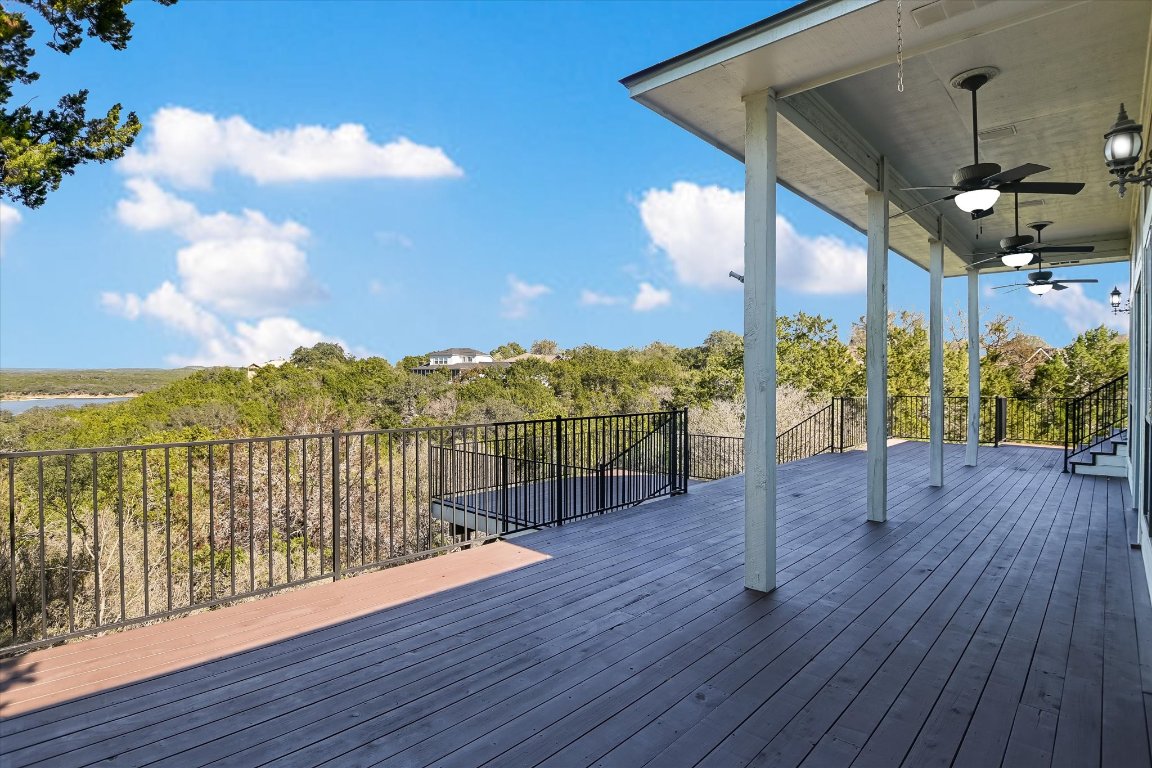 116 Courtside Way Spicewood, TX 78669 - Photo 6 of 40 a view of a balcony with wooden floor