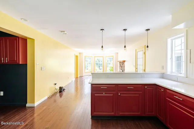 a bathroom with a double vanity sink toilet and shower