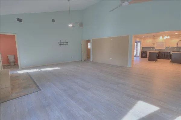 a view of a livingroom with wooden floor