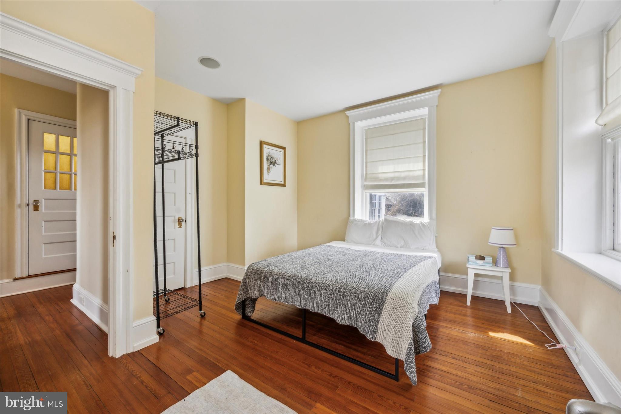 226 Fishers Road Bryn Mawr, PA 19010 - Photo 19 of 60 a bedroom with a bed and wooden floor