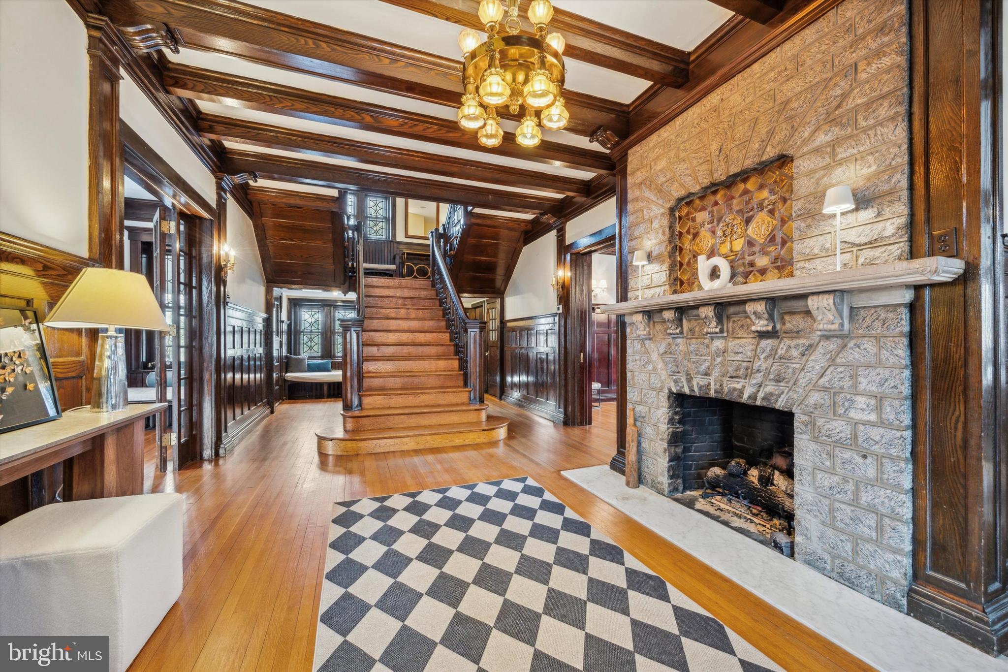 226 Fishers Road Bryn Mawr, PA 19010 - Photo 2 of 60 a lobby with furniture and a fireplace