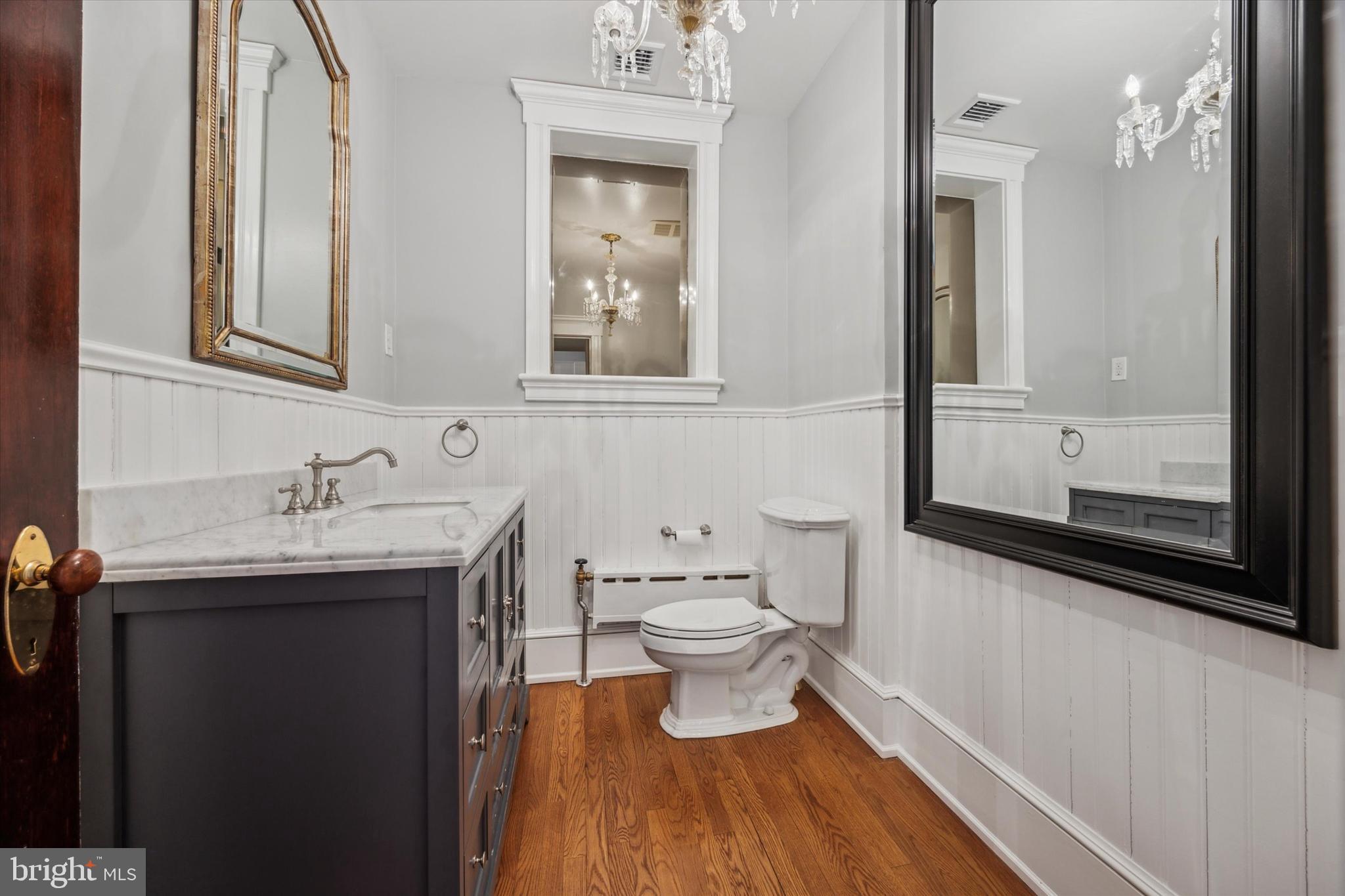 226 Fishers Road Bryn Mawr, PA 19010 - Photo 24 of 60 a bathroom with a sink and a mirror