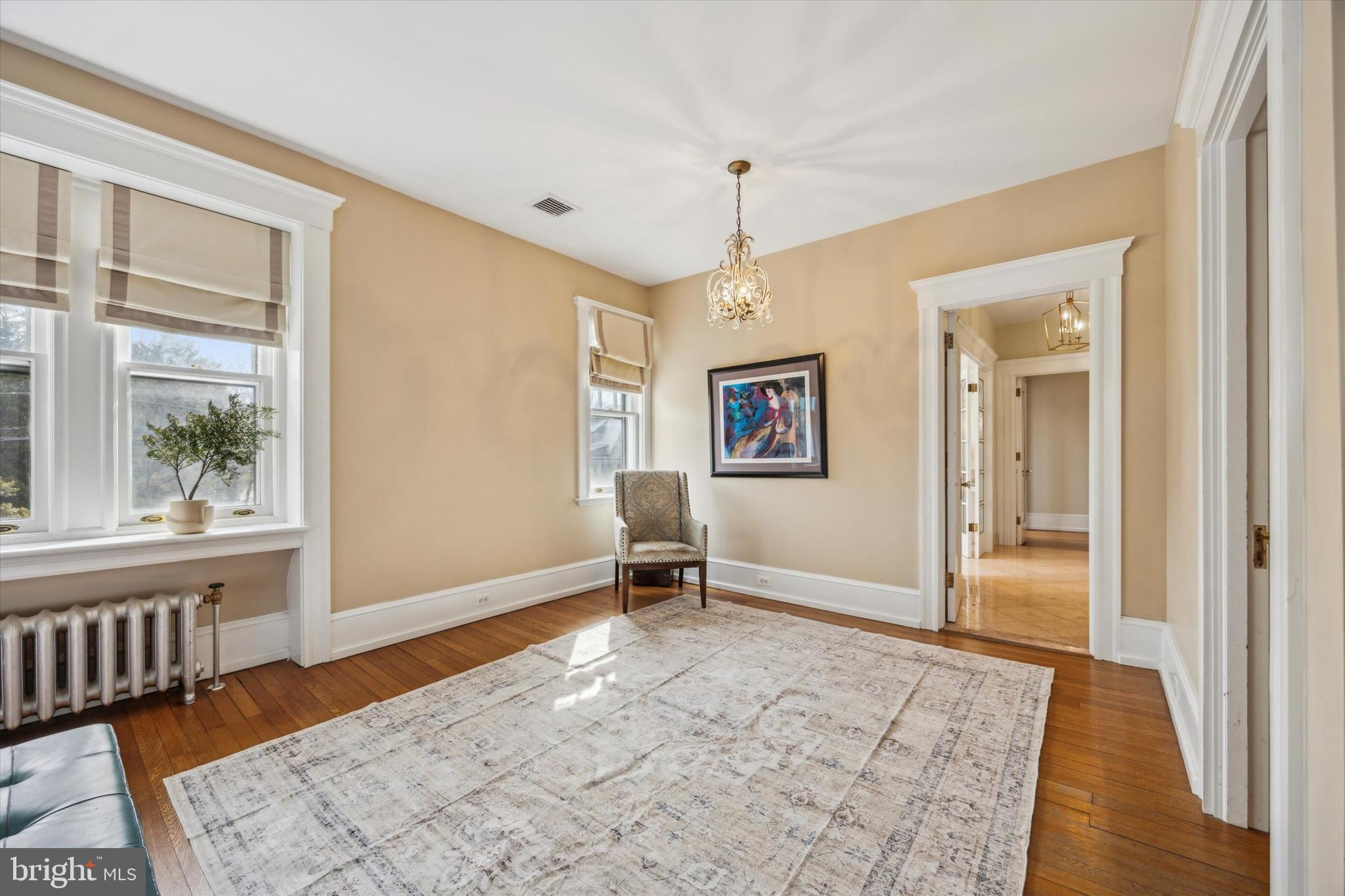 226 Fishers Road Bryn Mawr, PA 19010 - Photo 26 of 60 a view of an empty room with window and wooden floor