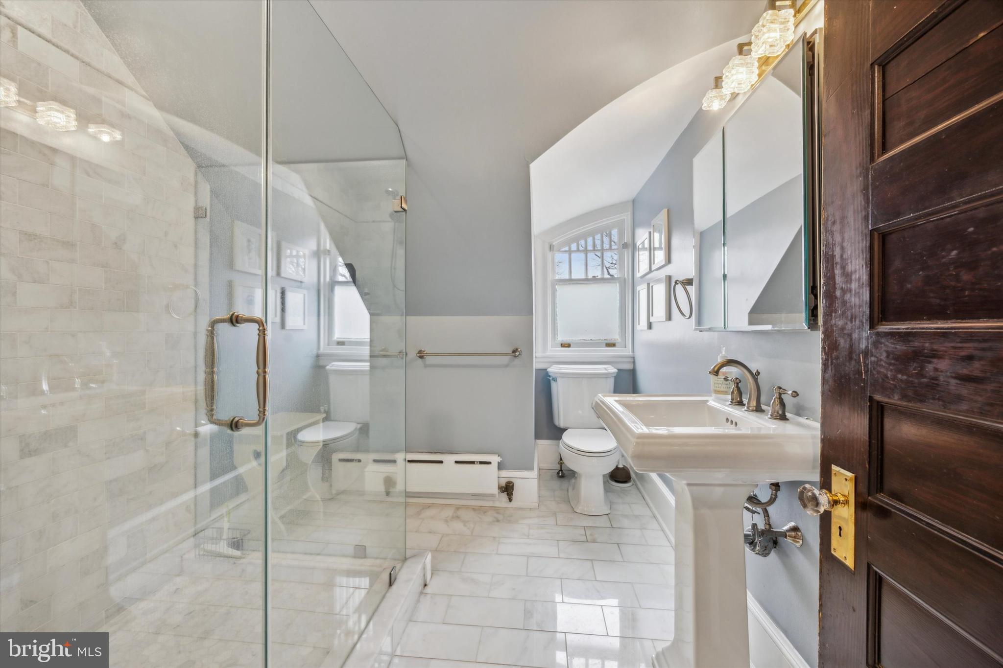 226 Fishers Road Bryn Mawr, PA 19010 - Photo 36 of 60 a bathroom with a sink toilet and shower
