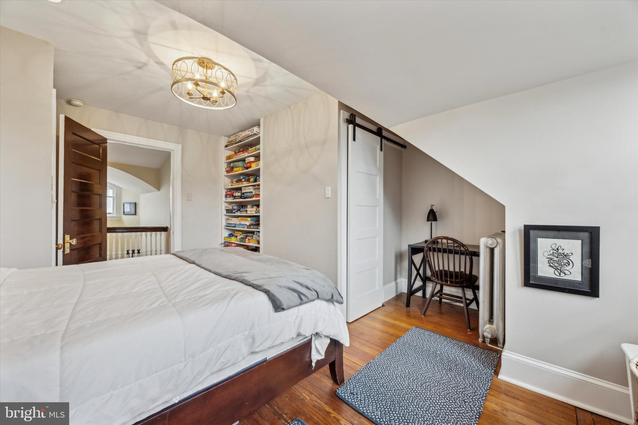 226 Fishers Road Bryn Mawr, PA 19010 - Photo 39 of 60 a bedroom with a bed and a table in it