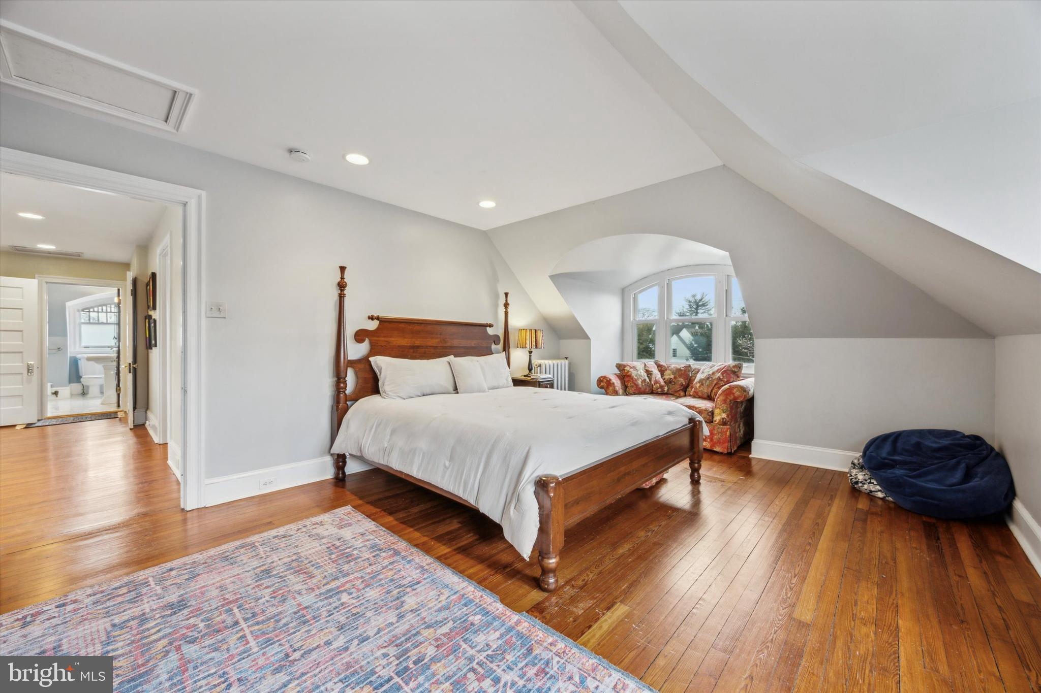 226 Fishers Road Bryn Mawr, PA 19010 - Photo 41 of 60 a bedroom with a bed and wooden floor