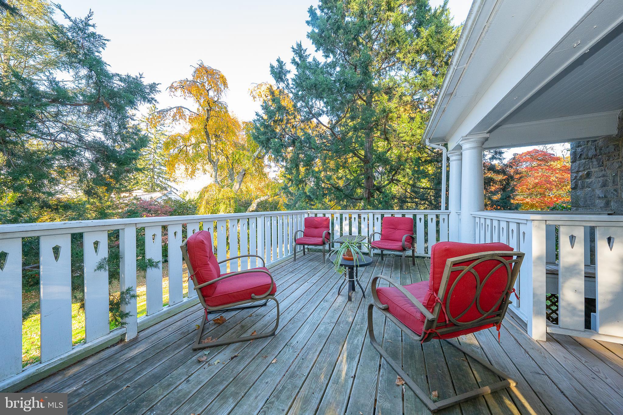 226 Fishers Road Bryn Mawr, PA 19010 - Photo 60 of 60 a balcony with wooden benches and furniture