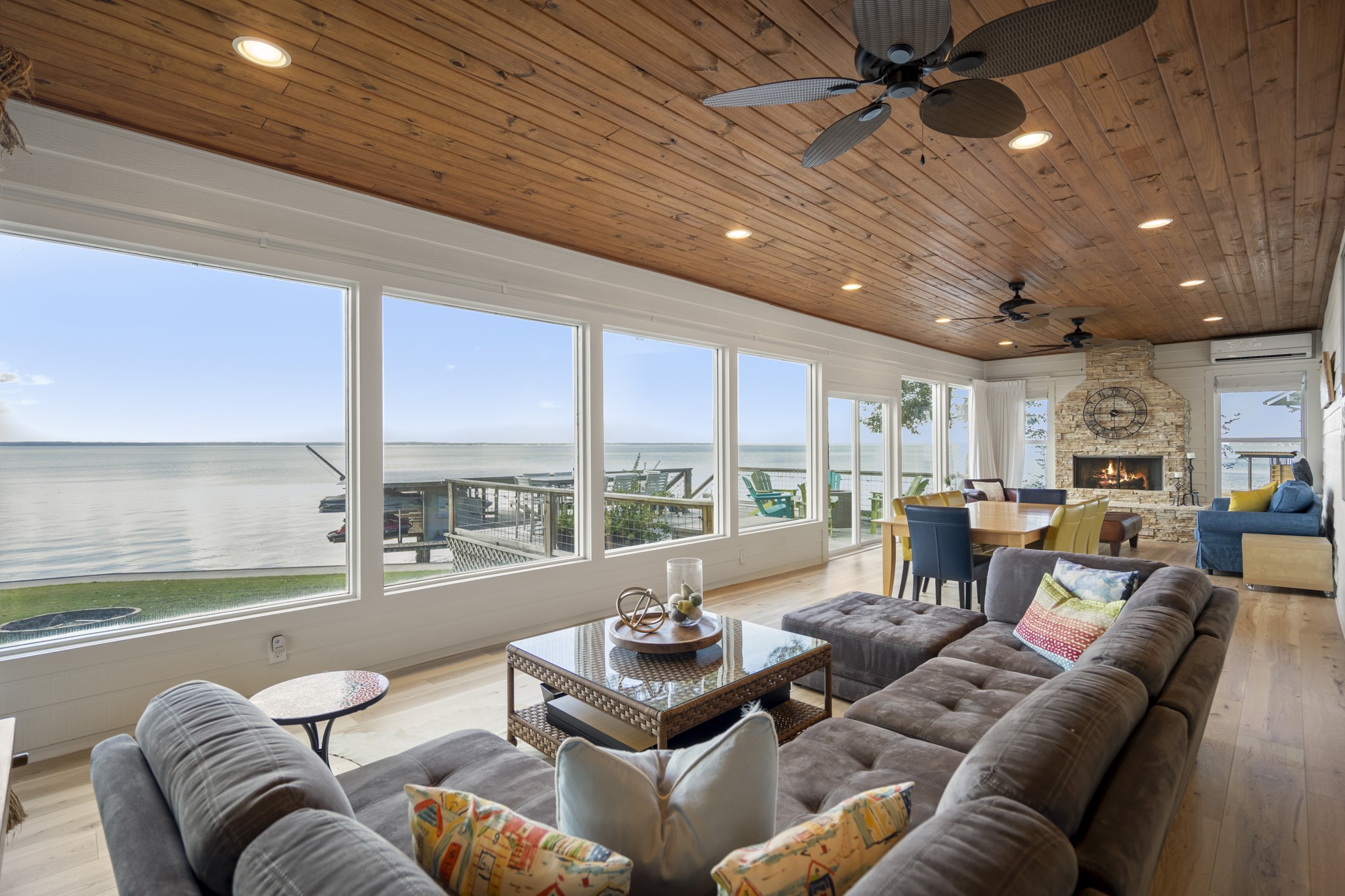 615 Inlet Drive Livingston, TX 77351 - Photo 16 of 50 Expansive sun room with stunning views of the lake!