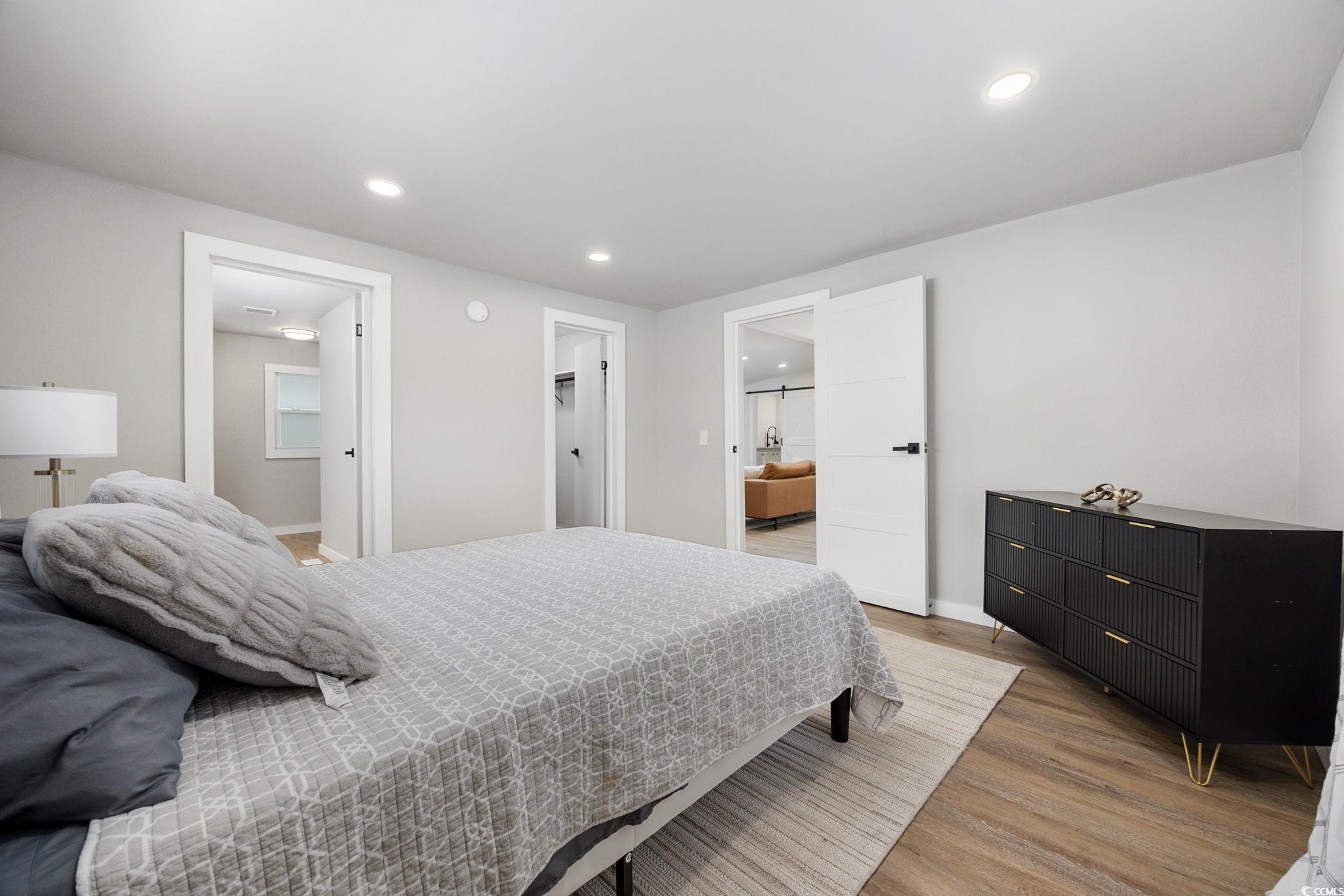 983 South Marlin Circle Murrells Inlet, SC 29576 - Photo 19 of 40 Bedroom featuring light wood finished floors and recessed lighting