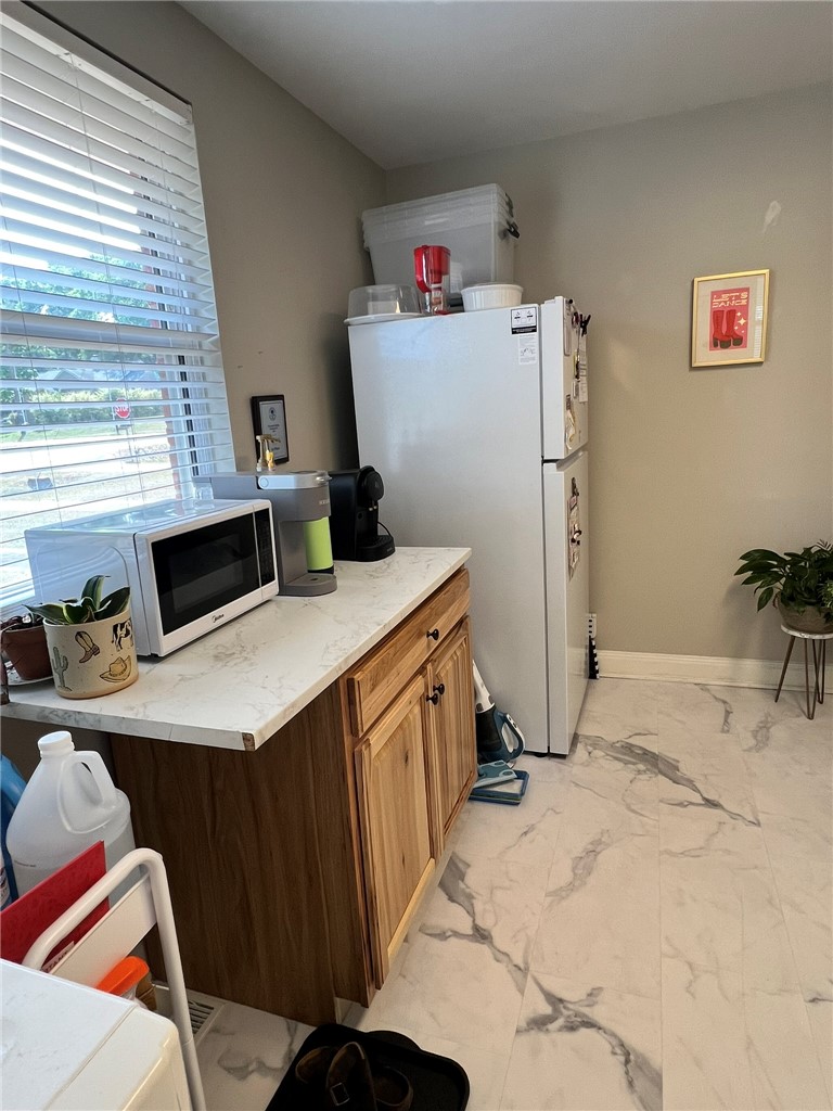 101 Clinton Drive, Unit B Anderson, SC 29621 - Photo 14 of 18 This bright kitchen features sleek appliances and ample cabinet space.